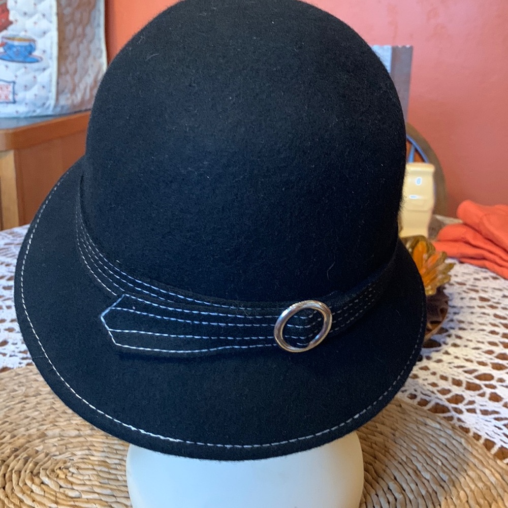 Ladies Black Wool Blend bucket  hat with white stitching .